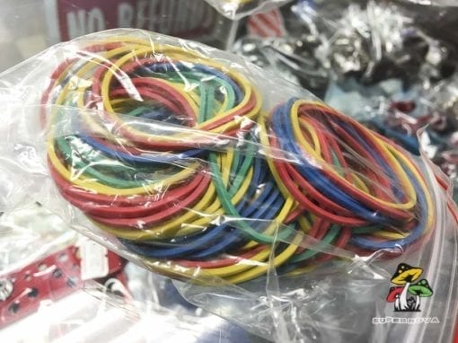 Photo of a small bag of rubber bands for Tattoo Machines.