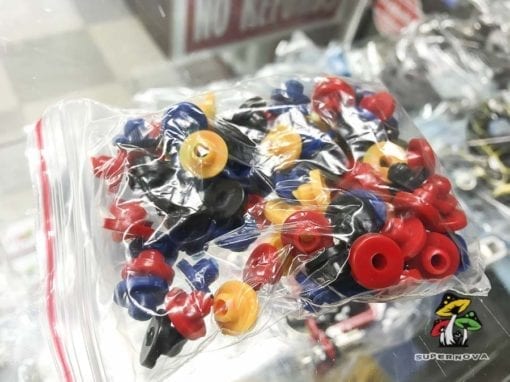 Photo of a plastic bag full of A-Bar Rubber Grommets for Tattoo Machines.